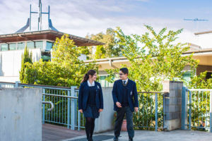 Students walking on elevated footpath at Clancy Catholic College West Hoxton